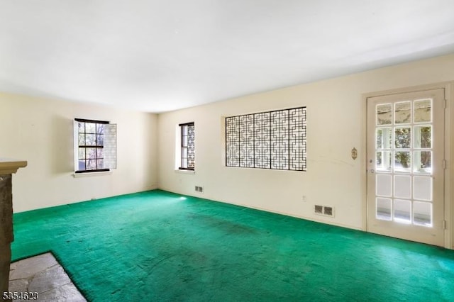 630 Ridgewood Rd, Maplewood Twp, NJ 07040 - unfurnished living room with visible vents and carpet flooring