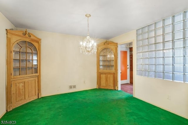 630 Ridgewood Rd, Maplewood Twp, NJ 07040 - unfurnished dining area featuring an inviting chandelier, carpet flooring, and visible vents