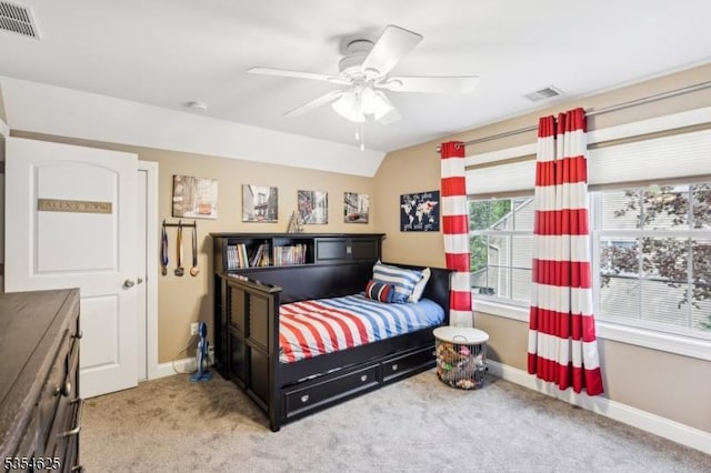 bedroom with baseboards, ceiling fan, light carpet, and visible vents