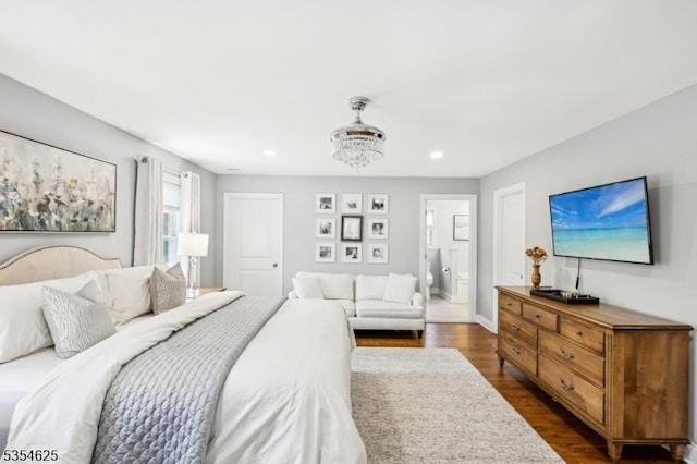 bedroom with recessed lighting, dark wood-style flooring, and baseboards