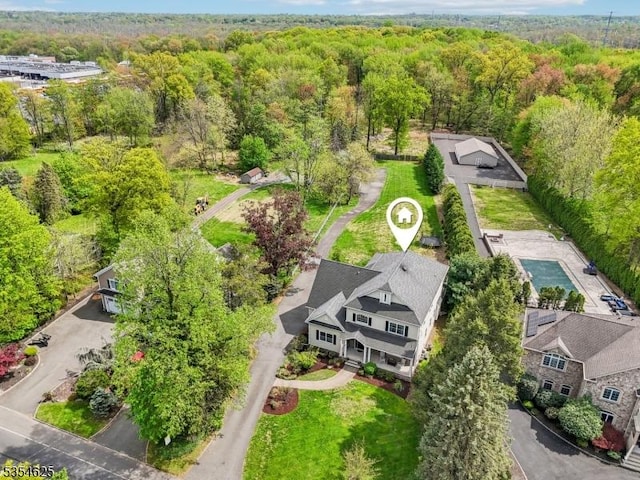 drone / aerial view with a forest view