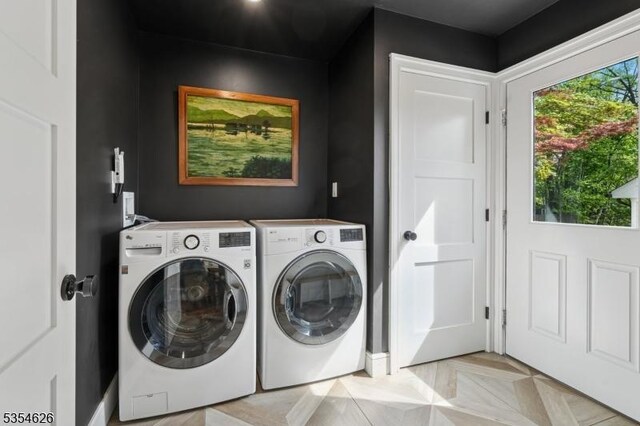 laundry room featuring laundry area and washer and clothes dryer