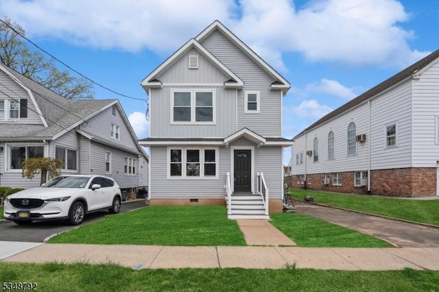 553 Thoreau Ter, Union Twp, NJ 07083 - view of front of home featuring board and batten siding and a front yard