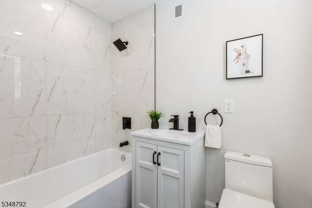 553 Thoreau Ter, Union Twp, NJ 07083 - bathroom featuring vanity, shower / bathing tub combination, and toilet