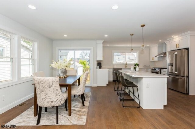 553 Thoreau Ter, Union Twp, NJ 07083 - dining room featuring baseboards, recessed lighting, dark wood-style floors, and visible vents