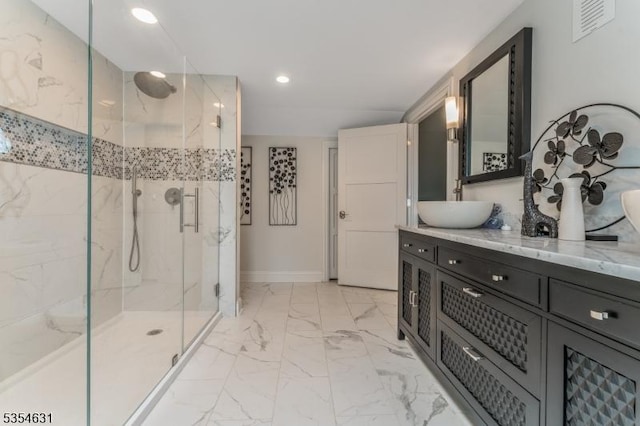 full bathroom with visible vents, a marble finish shower, marble finish floor, and vanity
