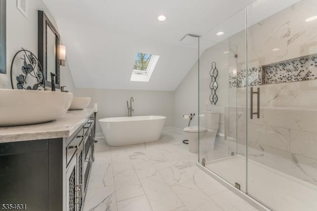 bathroom featuring vanity, a marble finish shower, marble finish floor, visible vents, and lofted ceiling with skylight