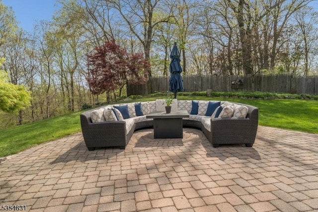 view of patio / terrace featuring an outdoor hangout area and a fenced backyard