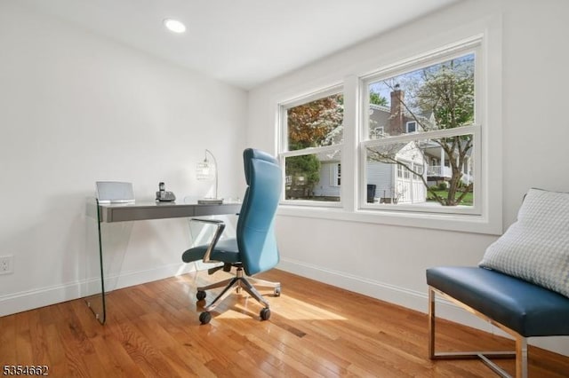 home office with baseboards, recessed lighting, and wood finished floors