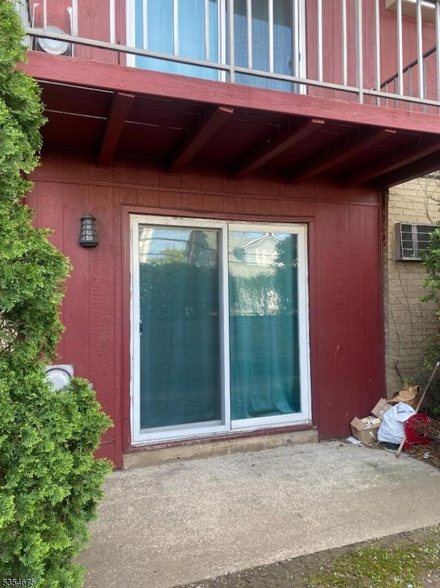 entrance to property featuring a balcony