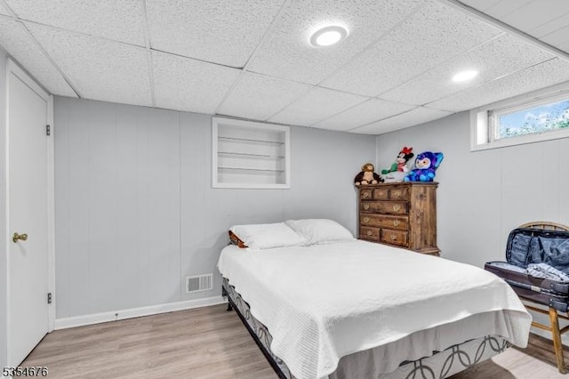 bedroom featuring light wood finished floors