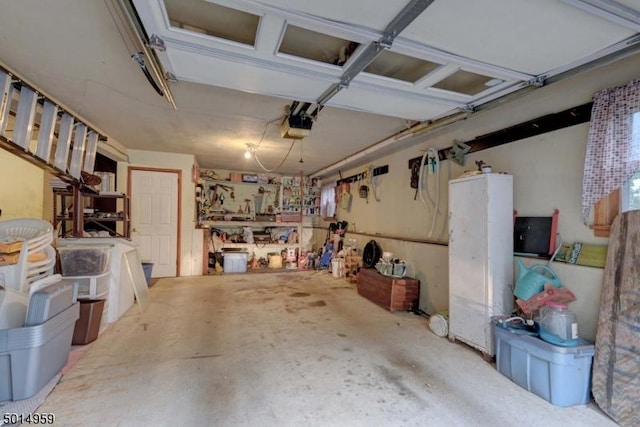 garage featuring a garage door opener
