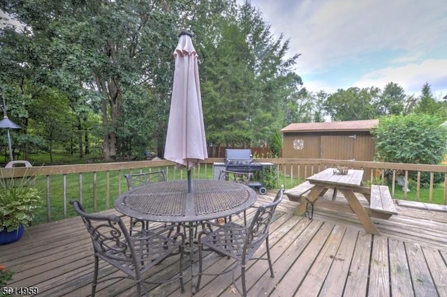 wooden deck featuring outdoor dining space