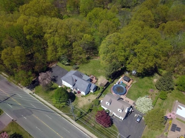 bird's eye view featuring a forest view