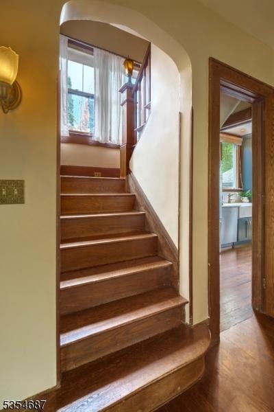 1 Ambar Pl, Bernardsville Boro, NJ 07924 - stairway with arched walkways and wood finished floors