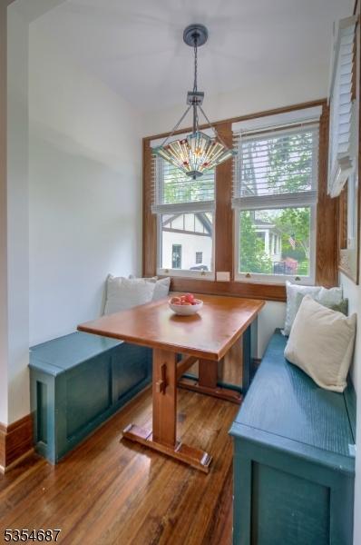 1 Ambar Pl, Bernardsville Boro, NJ 07924 - dining room with breakfast area, wood finished floors, and a chandelier