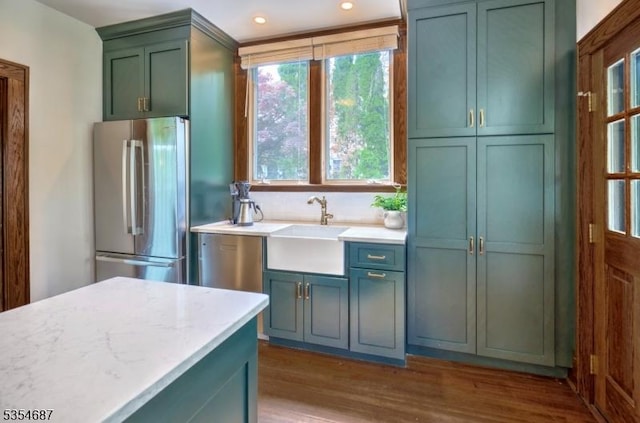 1 Ambar Pl, Bernardsville Boro, NJ 07924 - kitchen with freestanding refrigerator, a sink, green cabinetry, wood finished floors, and recessed lighting