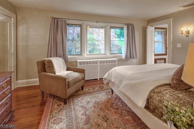 1 Ambar Pl, Bernardsville Boro, NJ 07924 - bedroom featuring radiator, wood finished floors, and baseboards
