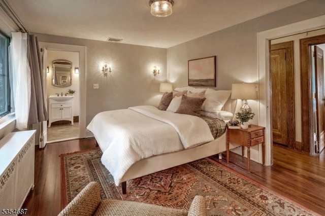 1 Ambar Pl, Bernardsville Boro, NJ 07924 - bedroom with radiator heating unit, dark wood finished floors, and a sink
