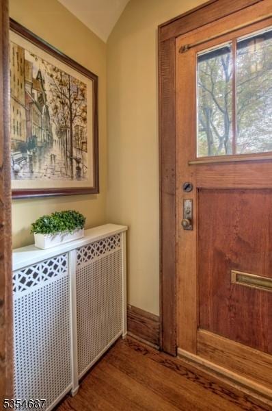 1 Ambar Pl, Bernardsville Boro, NJ 07924 - entryway featuring wood finished floors, lofted ceiling, and radiator heating unit