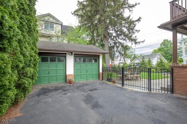 1 Ambar Pl, Bernardsville Boro, NJ 07924 - garage featuring driveway and fence