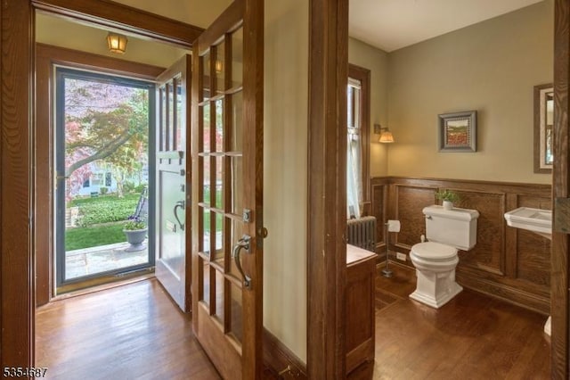 1 Ambar Pl, Bernardsville Boro, NJ 07924 - bathroom with toilet, wood finished floors, a wainscoted wall, radiator, and vanity