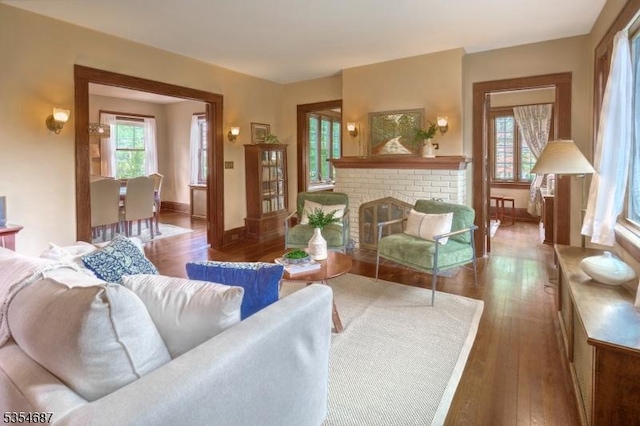 1 Ambar Pl, Bernardsville Boro, NJ 07924 - living room with hardwood / wood-style floors, baseboards, and a brick fireplace