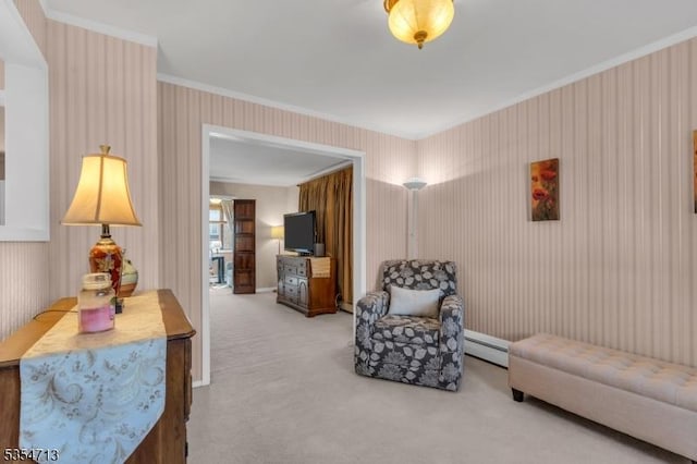 sitting room featuring carpet flooring, wallpapered walls, a baseboard heating unit, and ornamental molding