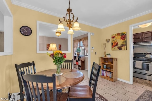 dining area with crown molding, baseboards, and a chandelier