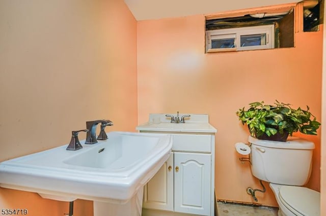 bathroom with a sink and toilet