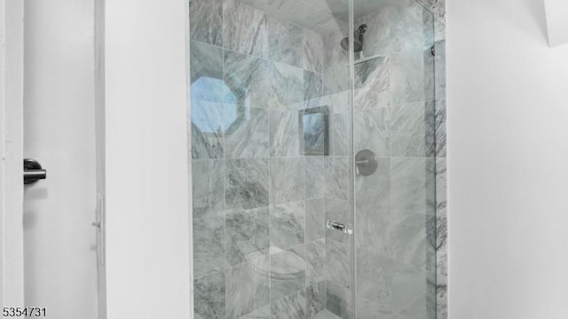 full bath featuring a stall shower