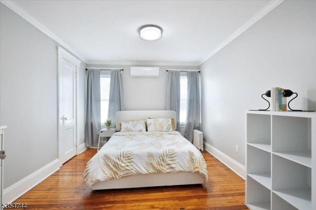 bedroom featuring an AC wall unit, ornamental molding, radiator heating unit, and multiple windows