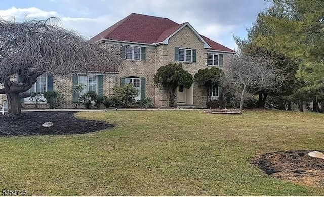 305 Old York Rd, Raritan Twp, NJ 08822 - colonial home with brick siding and a front yard