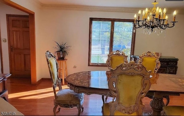 305 Old York Rd, Raritan Twp, NJ 08822 - dining space featuring crown molding, an inviting chandelier, and wood finished floors