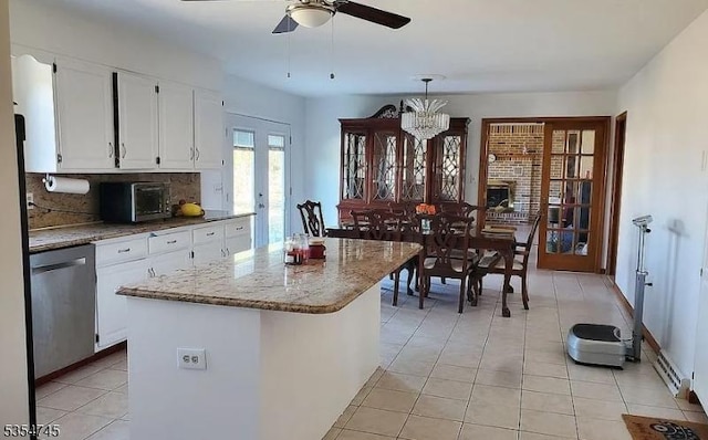 305 Old York Rd, Raritan Twp, NJ 08822 - kitchen featuring white cabinets, dishwasher, ceiling fan with notable chandelier, a center island, and tasteful backsplash