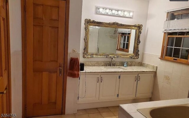305 Old York Rd, Raritan Twp, NJ 08822 - full bathroom with vanity, tile patterned floors, and tile walls