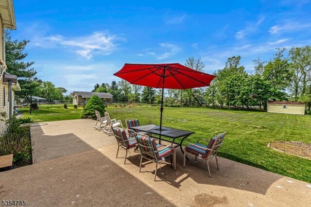 305 Old York Rd, Raritan Twp, NJ 08822 - view of patio / terrace with outdoor dining area and an outdoor structure