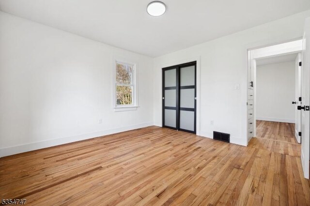 202 Parkside Ave, Pohatcong Twp, NJ 08865 - empty room featuring light wood-type flooring and baseboards