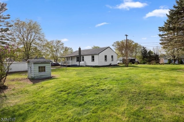 202 Parkside Ave, Pohatcong Twp, NJ 08865 - view of green lawn with a storage shed and an outdoor structure