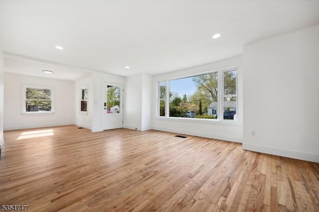 202 Parkside Ave, Pohatcong Twp, NJ 08865 - unfurnished living room with healthy amount of natural light, light wood finished floors, baseboards, and recessed lighting