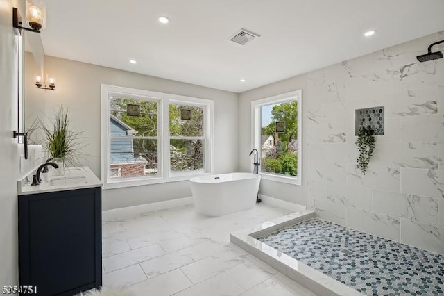 223 Victor St, Scotch Plains Twp, NJ 07076 - full bath featuring a tile shower, marble finish floor, recessed lighting, visible vents, and a soaking tub