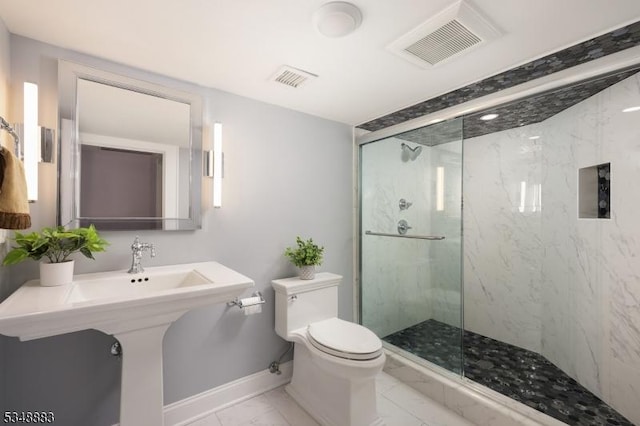 full bath with visible vents, marble finish floor, a marble finish shower, and toilet