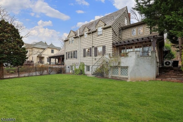 rear view of house featuring a yard, fence, and a chimney