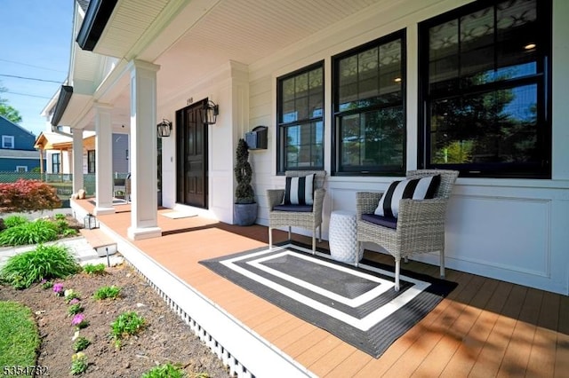 wooden deck with covered porch