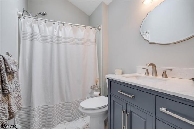 full bath featuring vanity, tile patterned flooring, lofted ceiling, curtained shower, and toilet