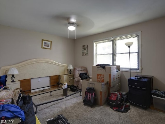 carpeted bedroom featuring a ceiling fan