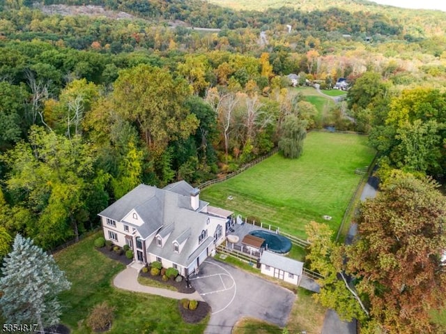 drone / aerial view with a forest view