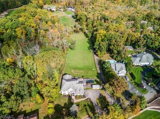 aerial view featuring a forest view