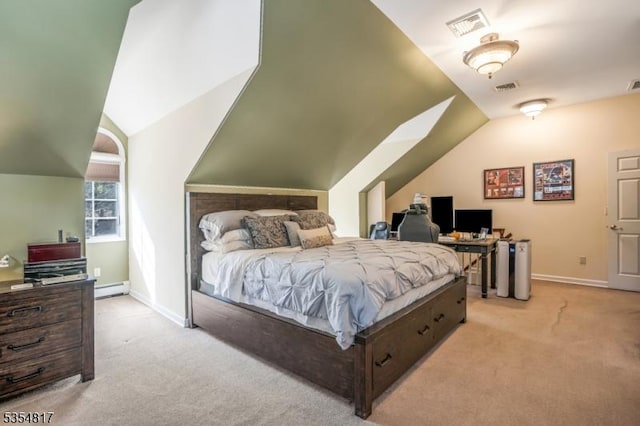 bedroom featuring baseboard heating, vaulted ceiling, and light carpet