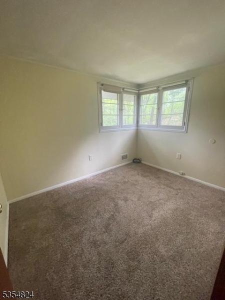 218 Wawayanda Rd, Vernon Twp, NJ 07422 - carpeted empty room featuring baseboards